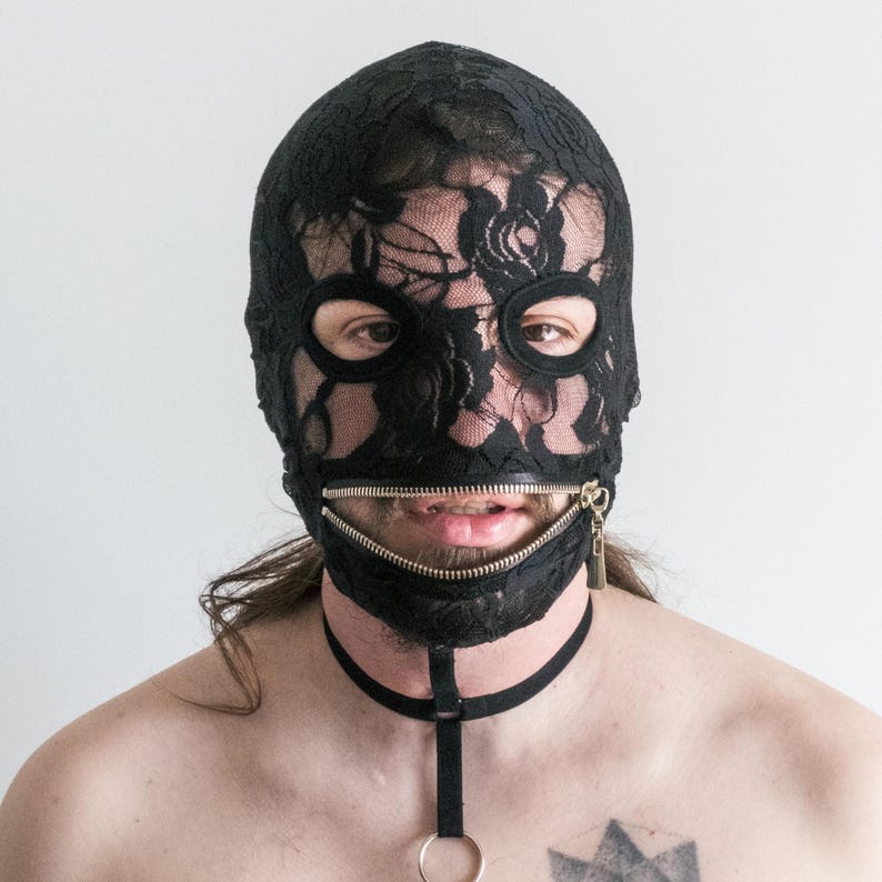 Black lace mask with zipper at the mouth that exposes the eyes 153